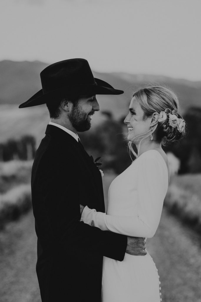 Looking for a romantic location for  couples photos? Foster Creek Farm in Montana is the perfect place. Complete with a luxurious white farmhouse, canvas tents, rolling hills, and a gorgeous mountain backdrop. What more could you want?